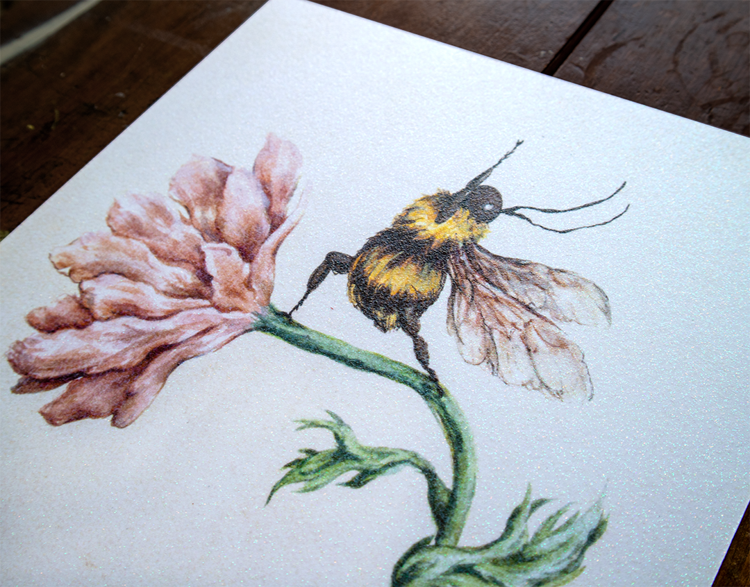 a print of a watercolour yoga bee illustration on diamond paper